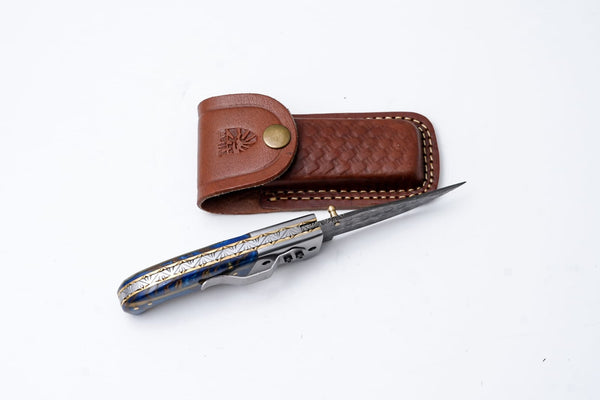 Hand-Engraved Folding Knife with Leather Sheath – Damascus-Inspired Detailing