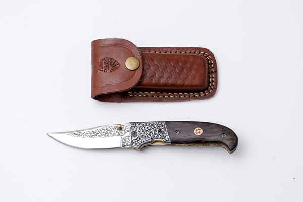 Hand-Engraved Folding Knife with Leather Sheath – Damascus-Inspired Detailing